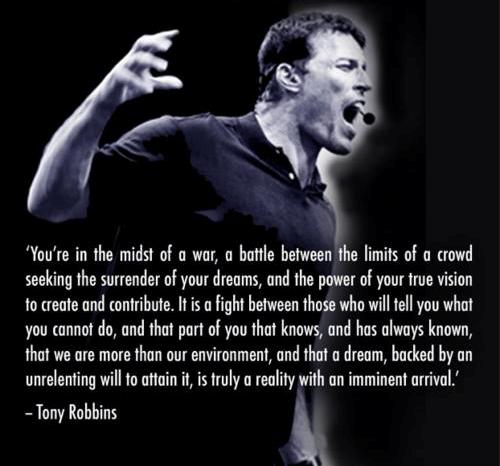Motivational Quote By Tony Robbins on Dreams: You're in the midst of a war, a battle between the limits of a crowd seeking the surrender of your dreams